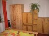 Oranges Schlafzimmer - Schrank